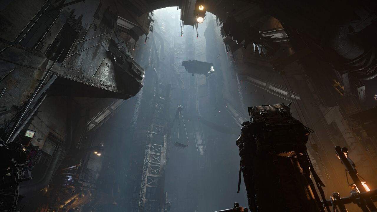 An official Squadron 42 screenshot of a dim interior with a large structure